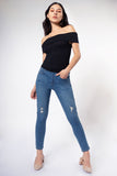 Jeans skinny tiro medio